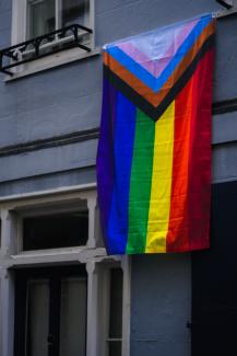 red yellow blue and purple flag by Jack Lucas Smith courtesy of Unsplash.